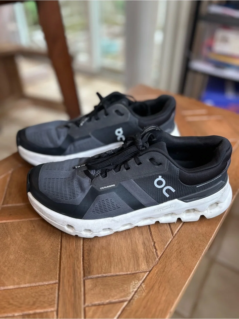 On Running Cloudrunner 2 Women’s Sneakers — Black and White